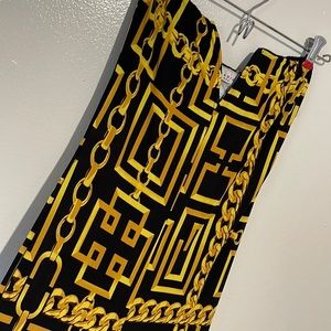 Strapless flare leg jump suit